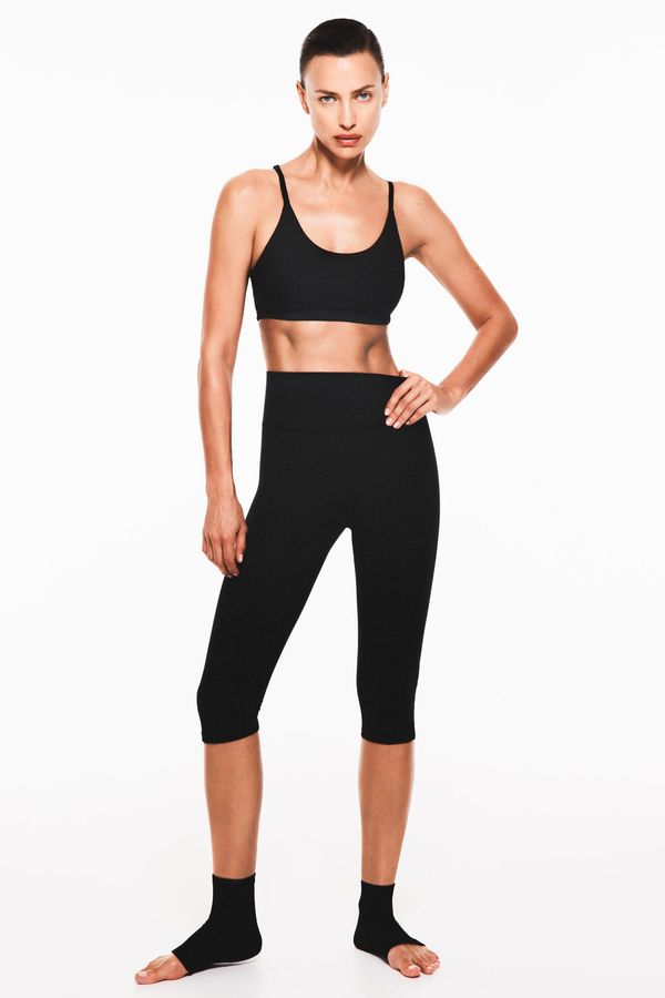 Leggings capri deportivas en SoftMove™